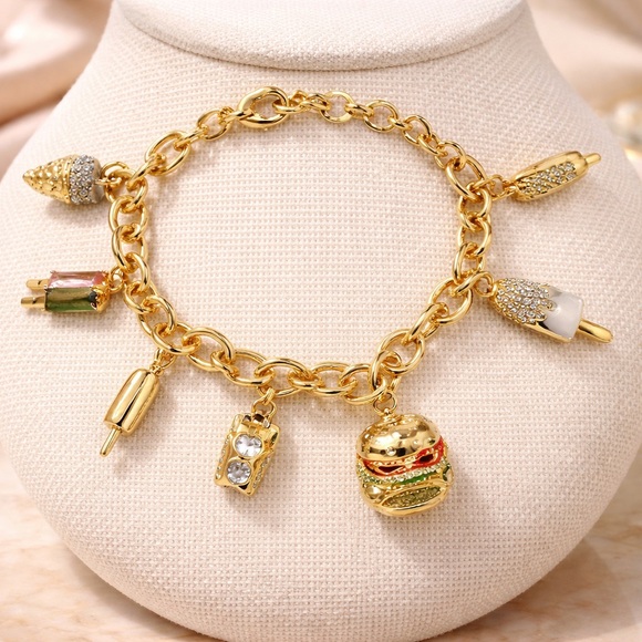 kate spade Jewelry - Kate Spade Gold Charm Bracelet with Fun Charms